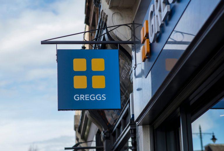 Greggs posts positive outlook, shares jump 14%