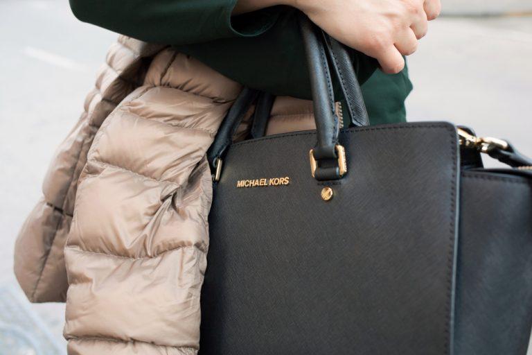 Michael Kors shares plunge 14%