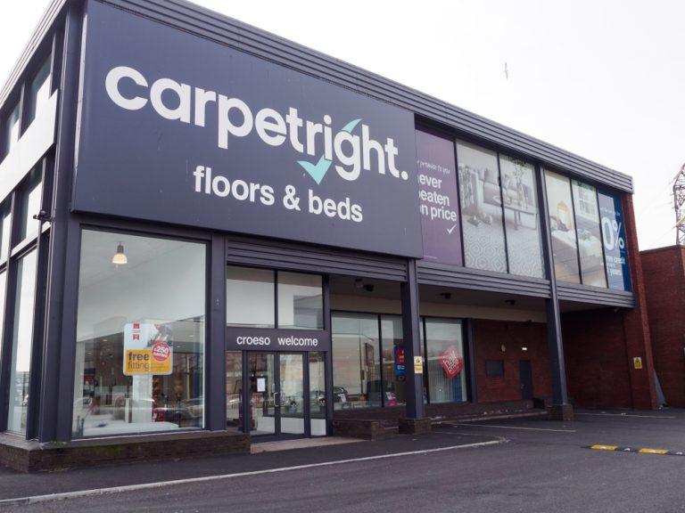 Carpetright’s largest shareholder takes on its debt