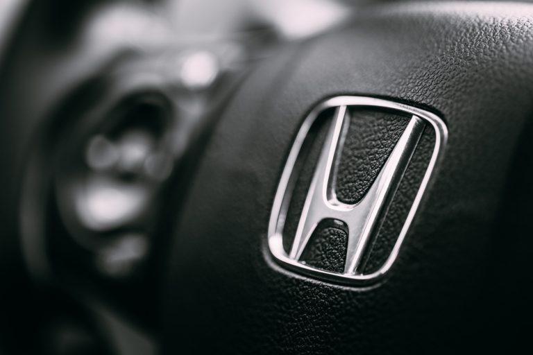 Honda cut their profit and sales forecast