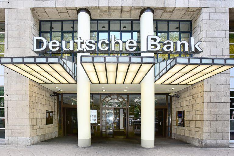 Deutsche Bank shares dip on modest predictions