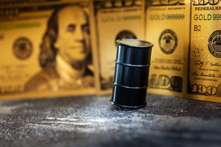 Oil price gains on weaker dollar