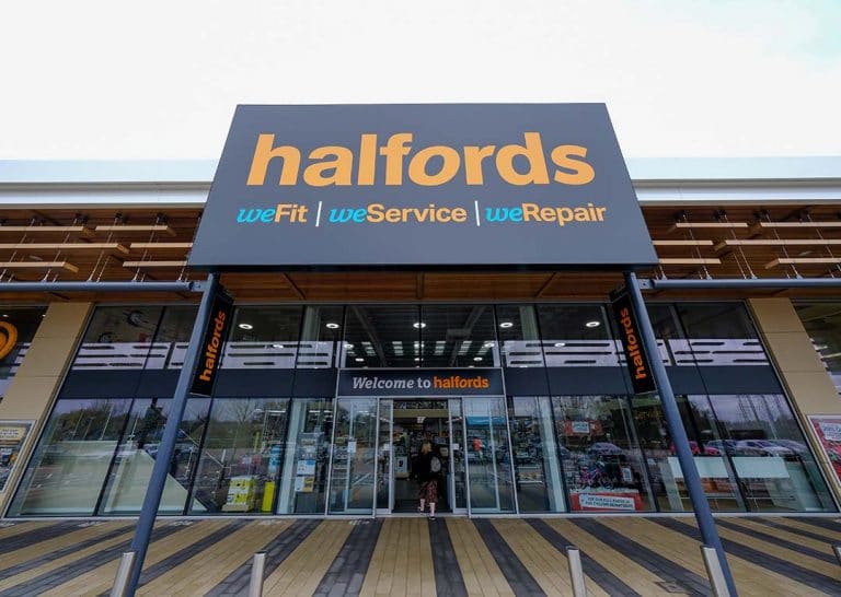 Halford shares rise despite slow first half