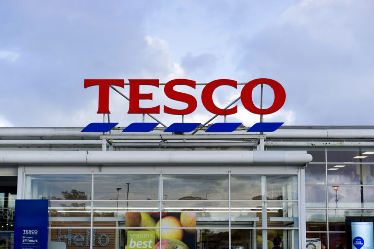 Tesco fights off discounters to increase market share as profits jump