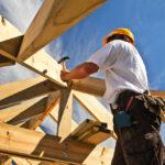Roofer,,Carpenter,Working,On,Roof,Structure,On,Construction,Site