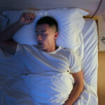 Top,View,Of,Asian,Young,Man,Snores,When,He,Sleep