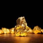 Closeup,Of,Big,Gold,Nugget,Finance,Concept