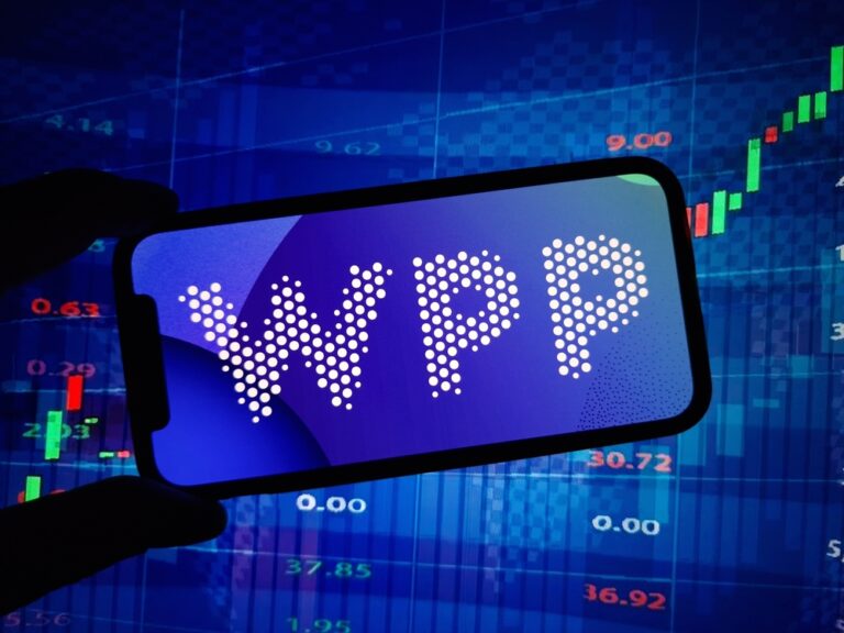 WPP shares sink on profit downgrade