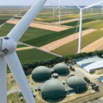 Green,Energy,Synergy.,Close-up,Of,Wind,Turbine,With,Biogas,Plant